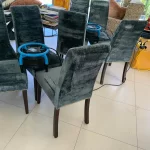 Professional upholstery cleaning for dining chairs using advanced cleaning equipment.