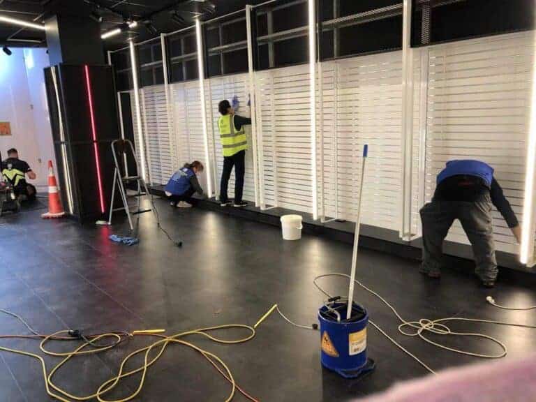 Triple Star Commercial Cleaning team deep cleaning a newly built retail store after construction in Auckland and Christchurch.